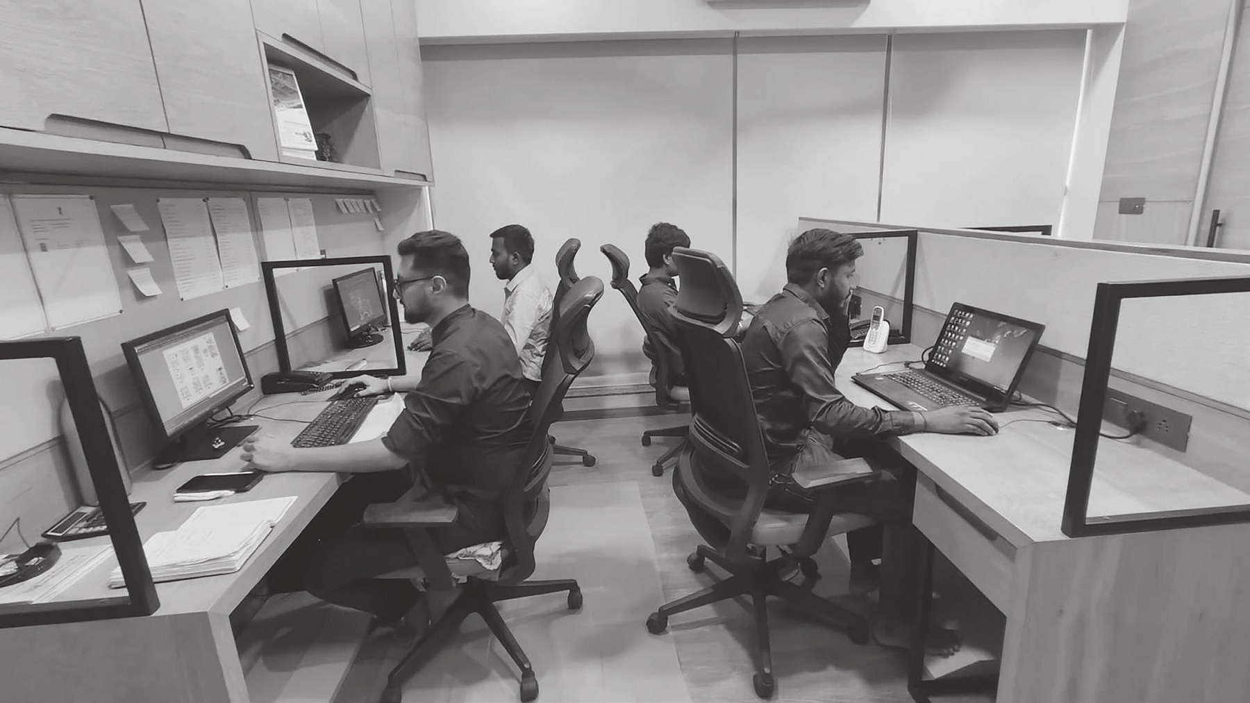 Engineers at work in the Accumen design studio